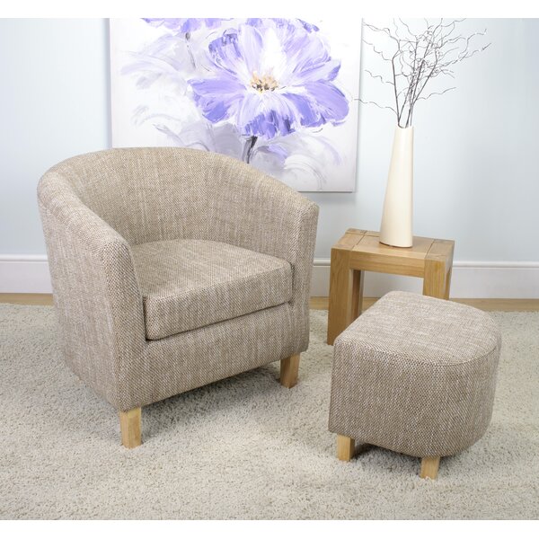 Tub chair with on sale integrated footstool